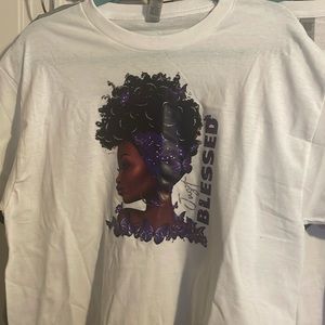 A large, white, woman’s “blessed” t shirt.